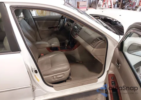 2006 Toyota Camry Xle z USA, uszkodzony, nr VIN 4T1BE30K26U665914